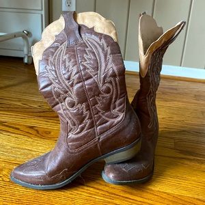 Cowgirl boots. Bought them for a bachelorette party and never wore them.